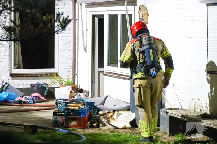 Kind roep om hulp bij woningbrand