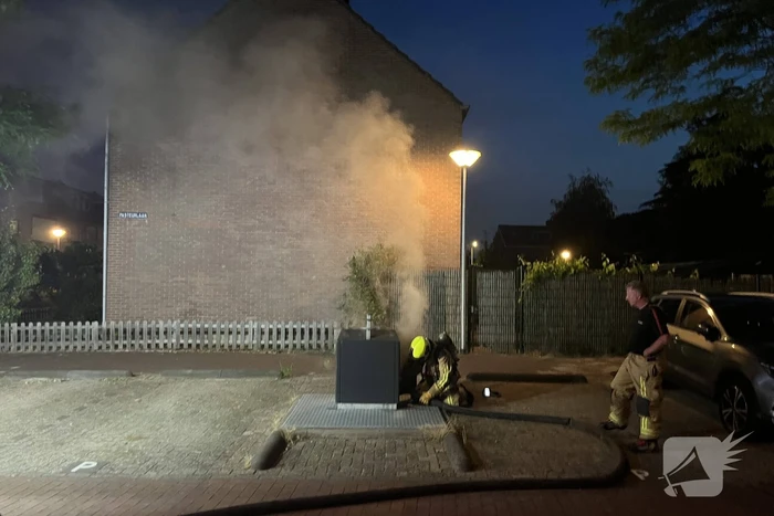 Brand in ondergrondse container