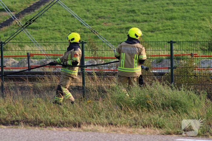 Flink stuk berm in brand