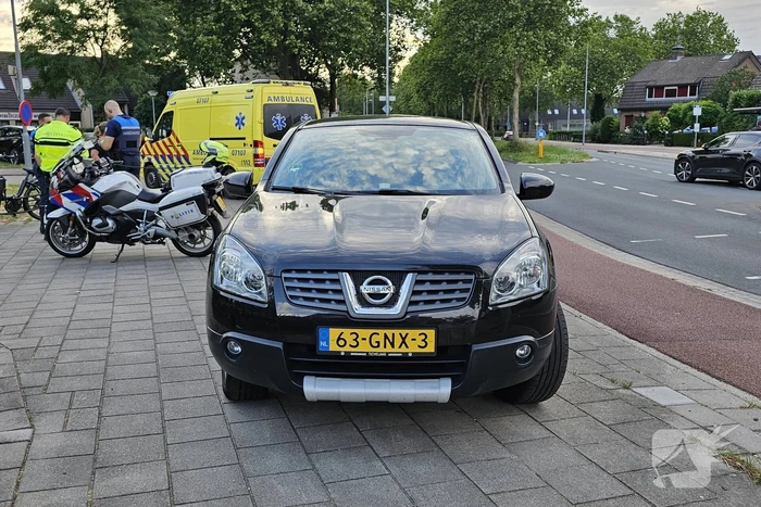 Bakfietser in botsing met personenauto