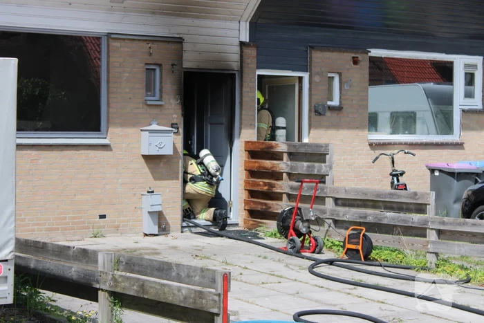 Woning flink beschadigd na brand, brandstichter aangehouden