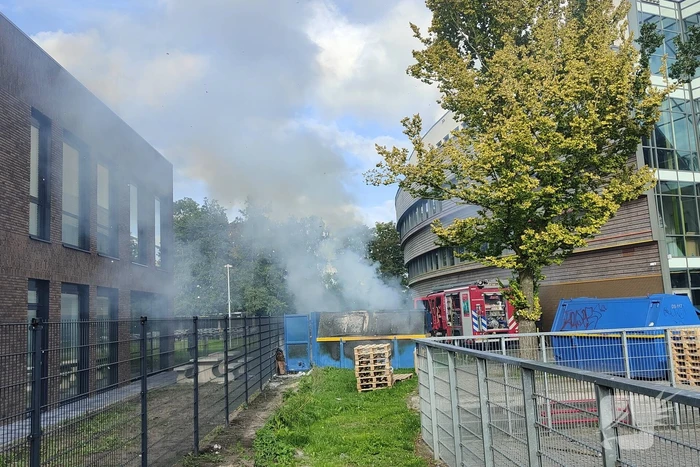 Rookontwikkeling door brand in papiercontainer