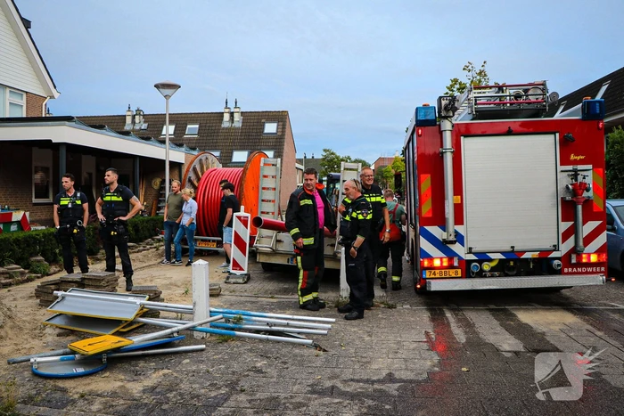 Straat onder water door leidingbreuk
