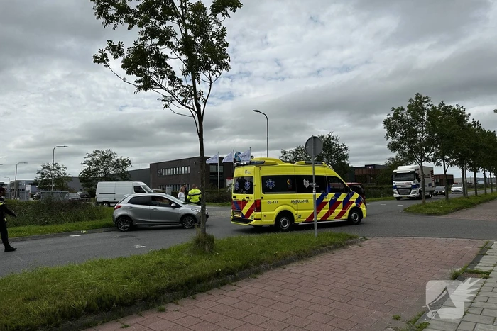 Schade na botsing op kruising