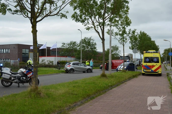 Schade na botsing op kruising
