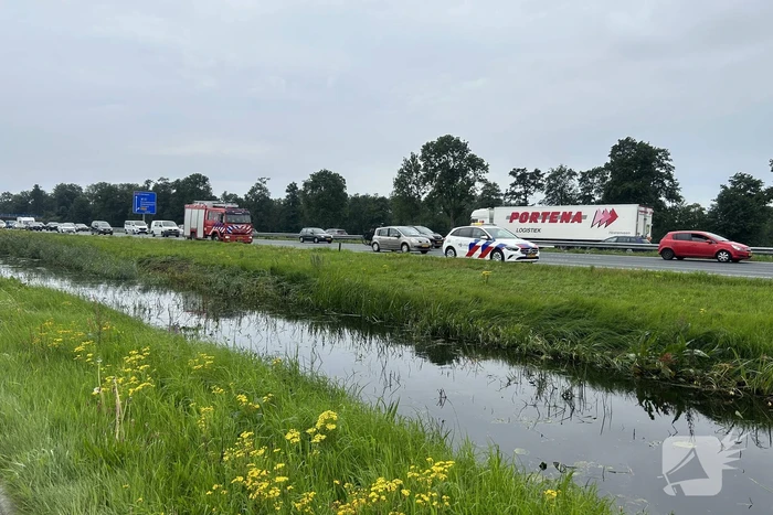 Flinke file door voertuig te water