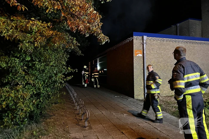 Deur in brand van oude gymzaal