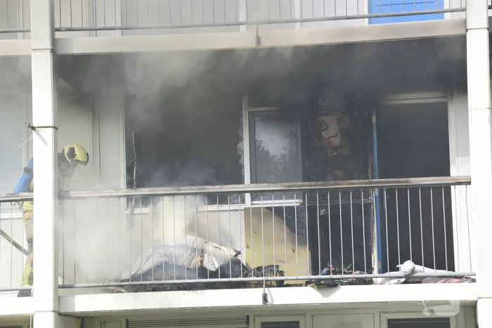 Woning in flat brandt volledig uit