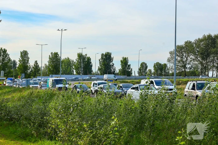 Lange files door milieu incident
