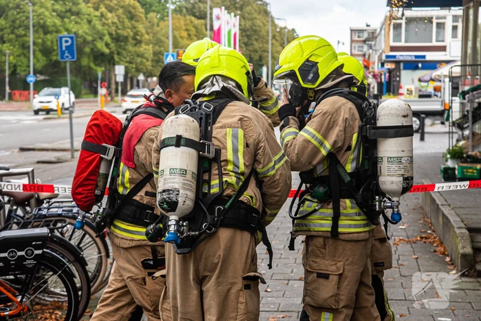 Salon vol rook door kelderbrand