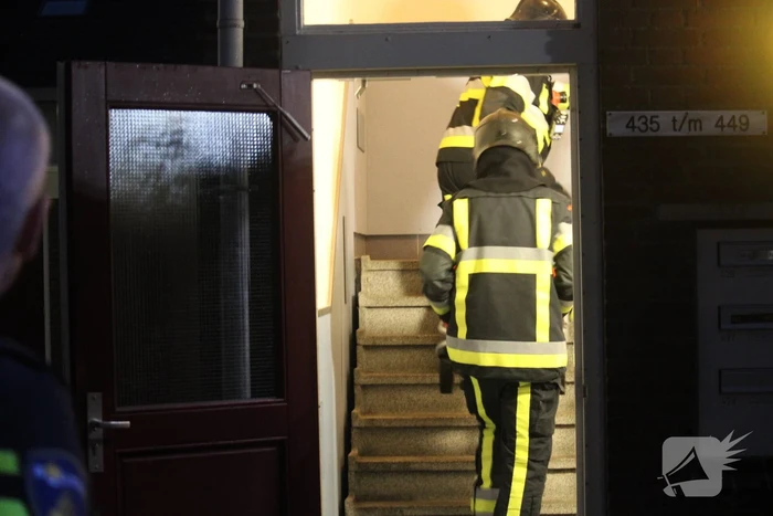 Uitslaande woningbrand snel onder controle