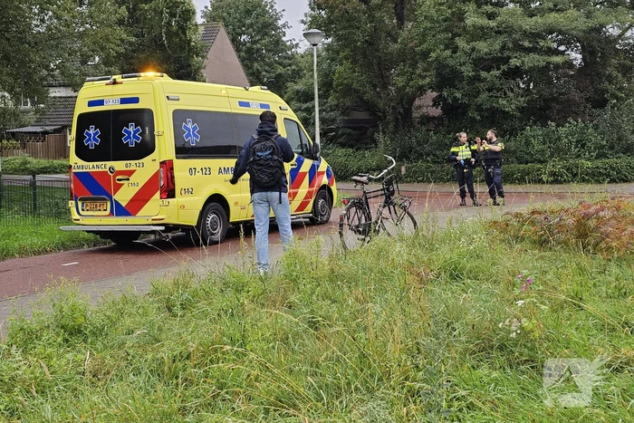 Fietsers ten val door nat wegdek
