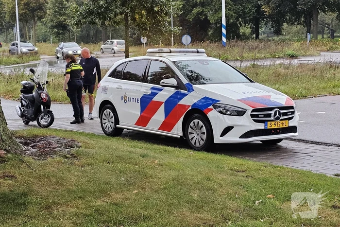 Scooter geschept door auto