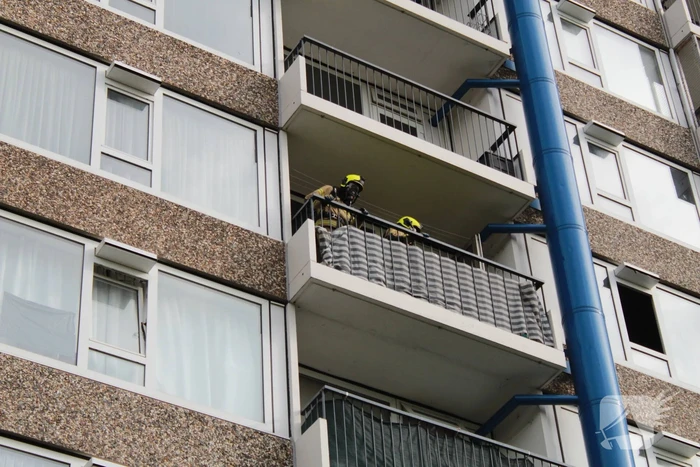 Rookontwikkeling in flat na brand