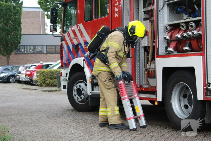 Rookontwikkeling in flat na brand