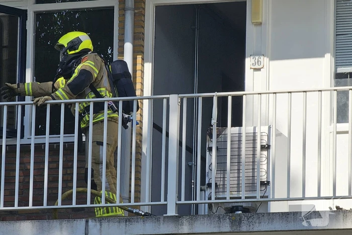 Persoon gewond bij brand in flatwoning