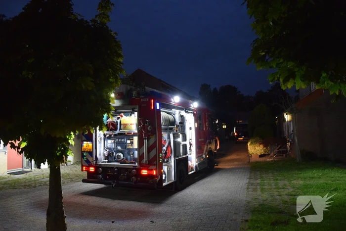 Kortsluiting koelkast veroorzaakt brand