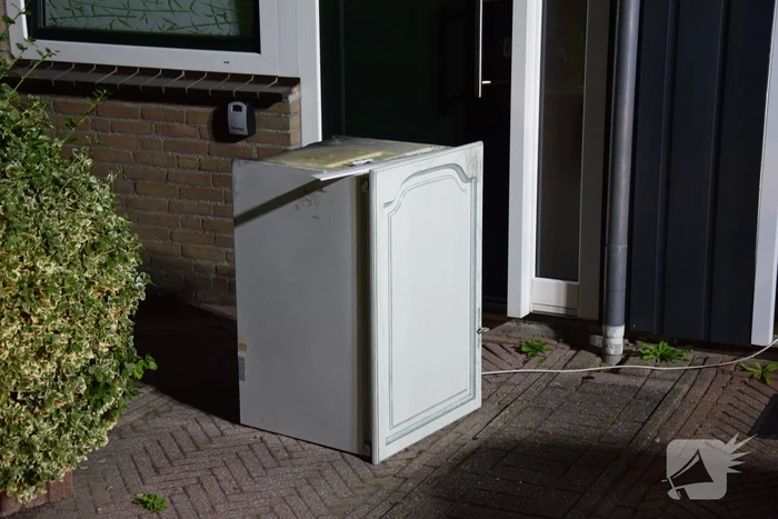 Kortsluiting koelkast veroorzaakt brand