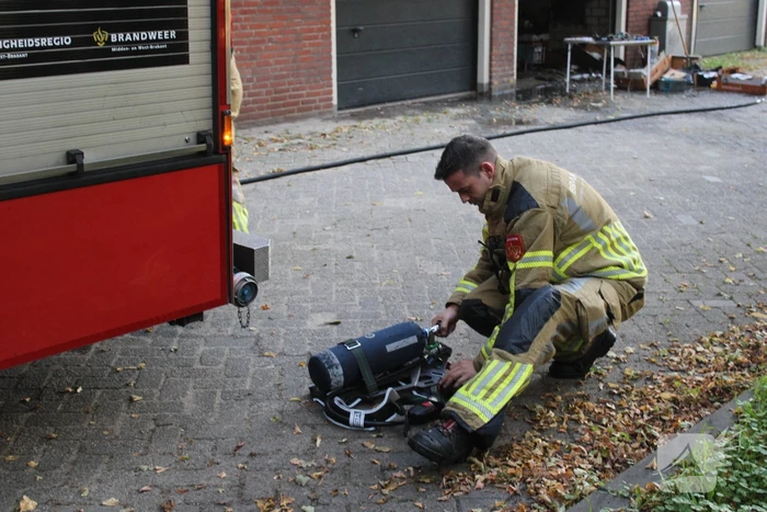 Brand in garagebox onder flatwoning