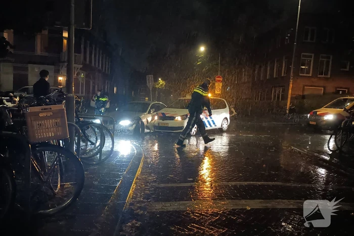 Politieauto in botsing met personenauto