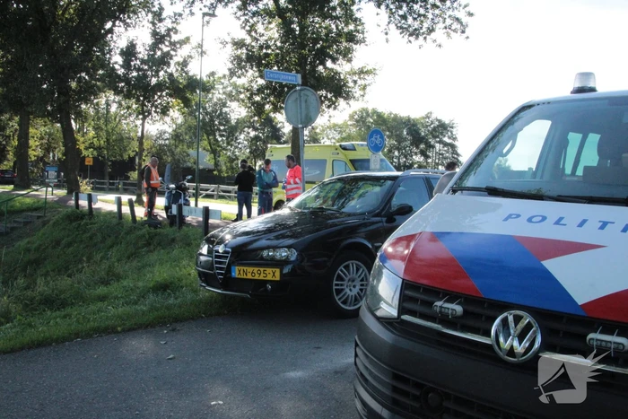 Aanrijding tussen auto en scooter