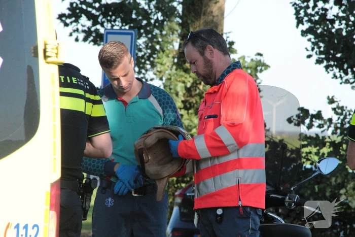 Aanrijding tussen auto en scooter