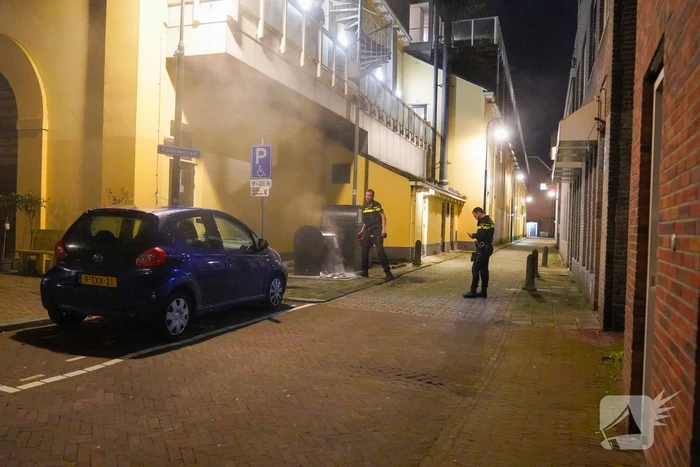 Rookontwikkeling door brand bij ondergrondse container