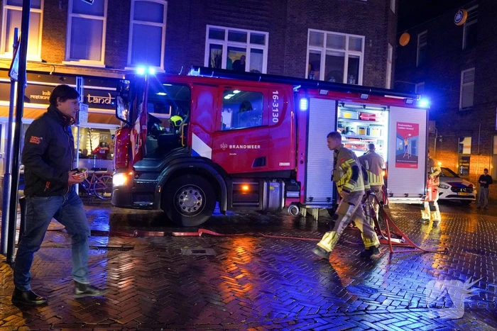 Brand in afzuigkap van woning