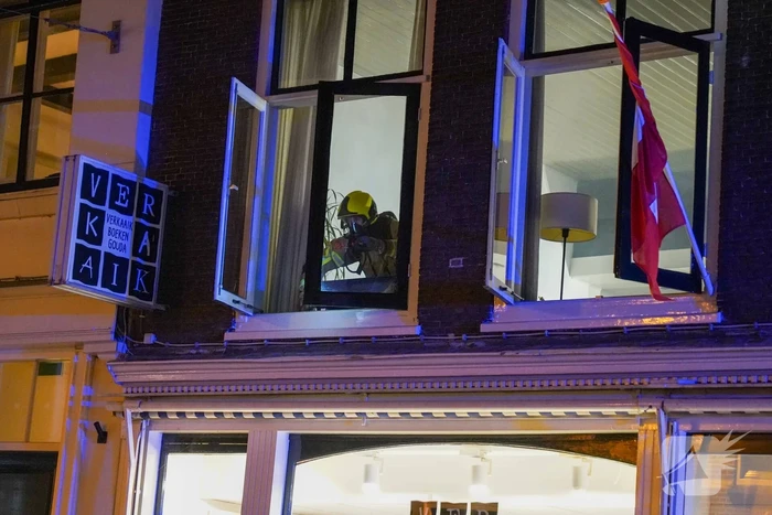 Brand in afzuigkap van woning