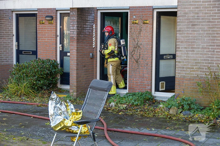 Bewoner uit woning gered tijdens keukenbrand