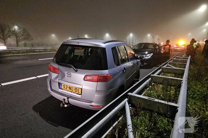 Personenauto's in botsing op afrit
