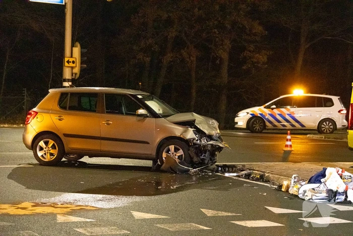 Inzittende bekneld bij verkeersongeval