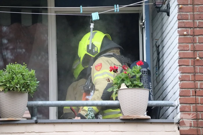 Rook in woning door pannetje op het vuur