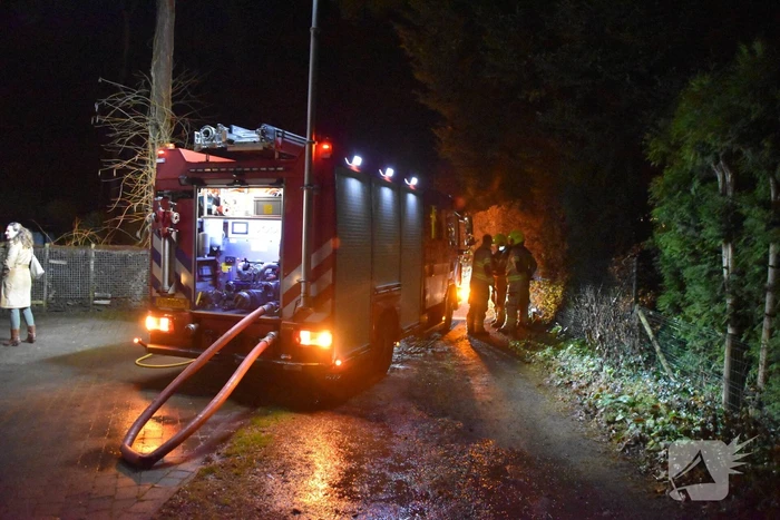 Containerhok verwoest door brand