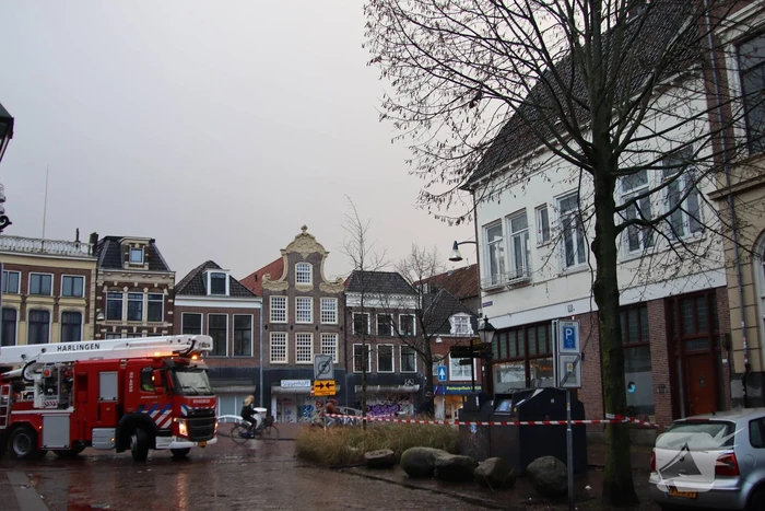 Dakrand dreigt te vallen door storm