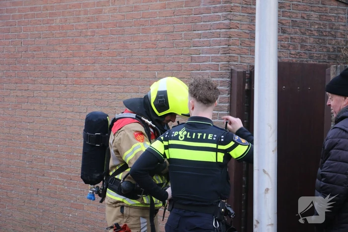 Flinke rookontwikkeling door brand na kortsluiting in koelkast