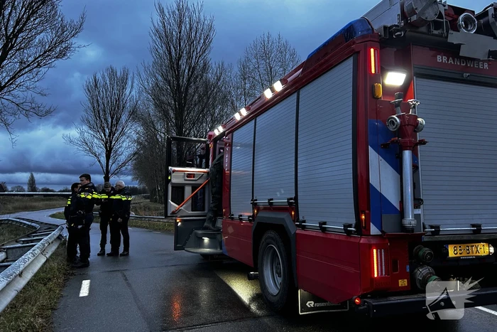 Auto te water inzittenden verlaten plaats ongeval