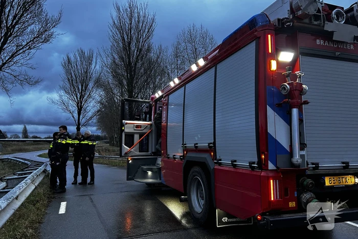 Auto te water inzittenden verlaten plaats ongeval