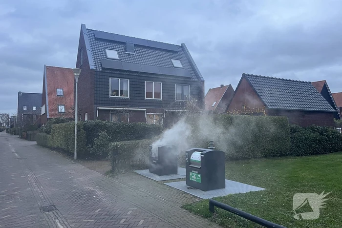 Ondergrondse container in brand