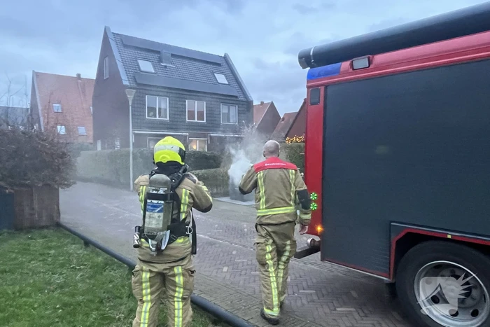 Ondergrondse container in brand