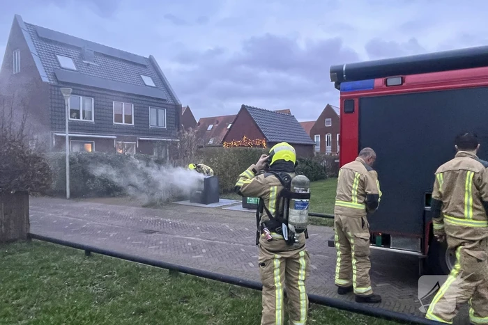 Ondergrondse container in brand