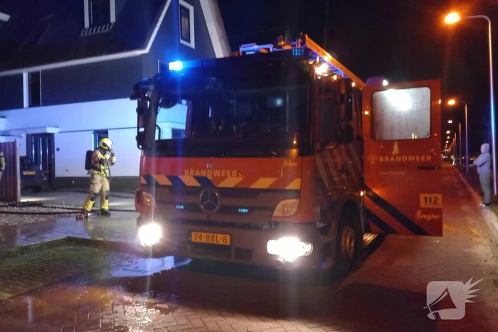 Afvalbrand bij woning