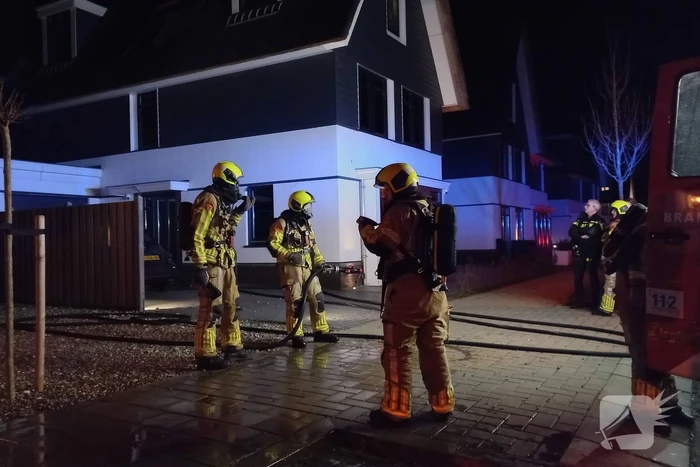 Afvalbrand bij woning