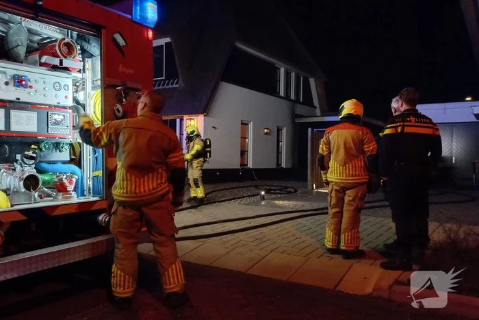 Afvalbrand bij woning