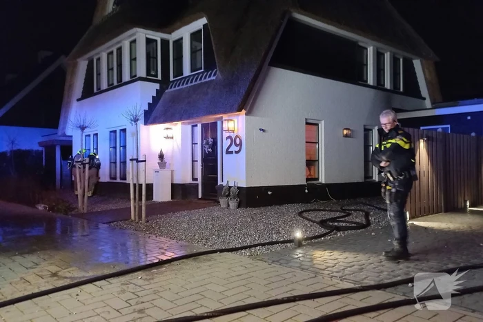 Afvalbrand bij woning