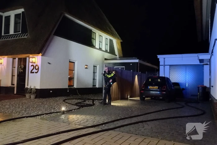 Afvalbrand bij woning
