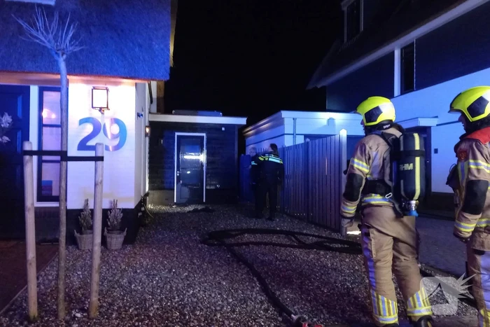 Afvalbrand bij woning