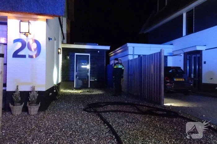 Afvalbrand bij woning