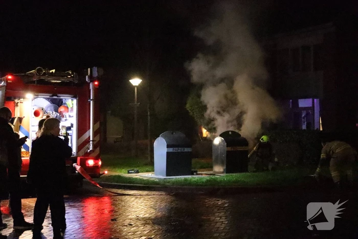 Ondergrondse container in brand gestoken