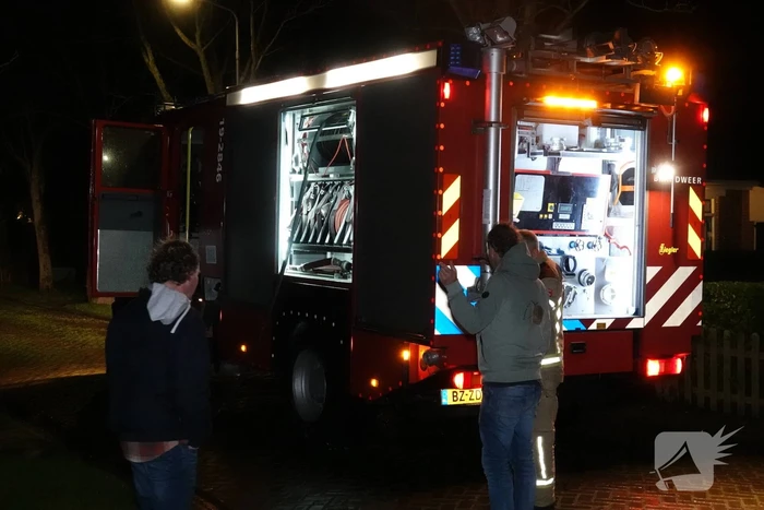 Felle brand in coniferenhaag